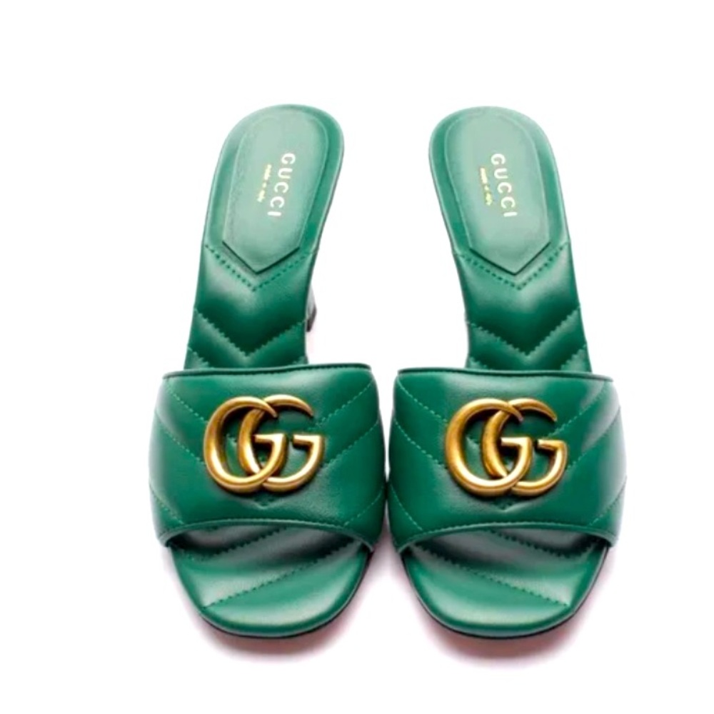 Emerald Gucci GG kitten heels